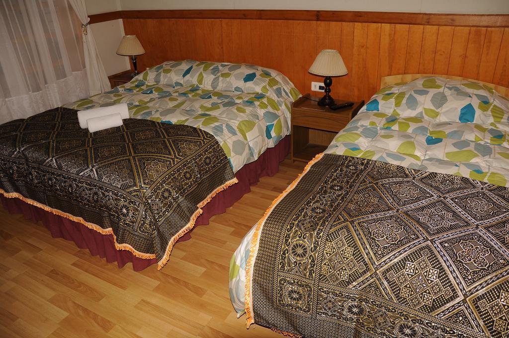 Hostal El Rincon プエルト・ナタレス 部屋 写真